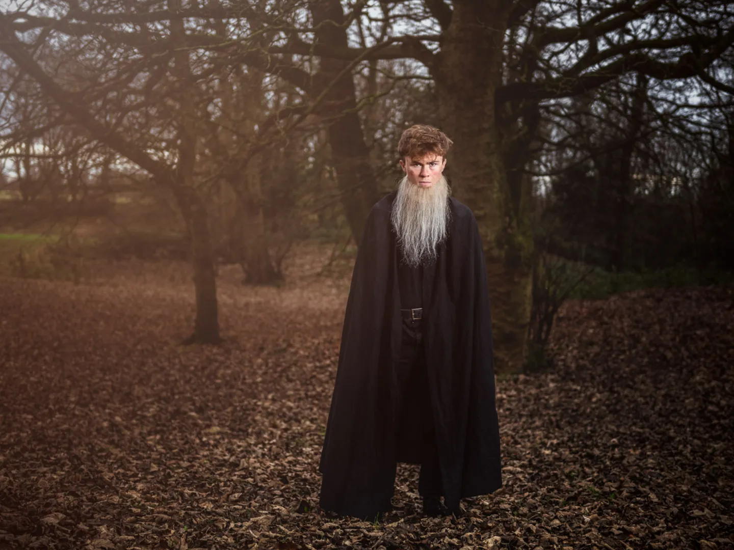 Monk walking the woods 