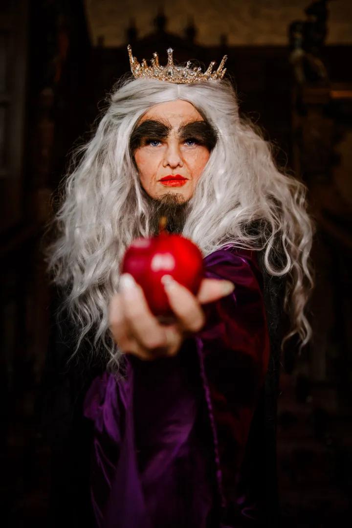 Witch holding an apple