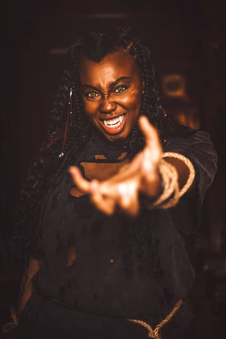 Vampire holding a hand out