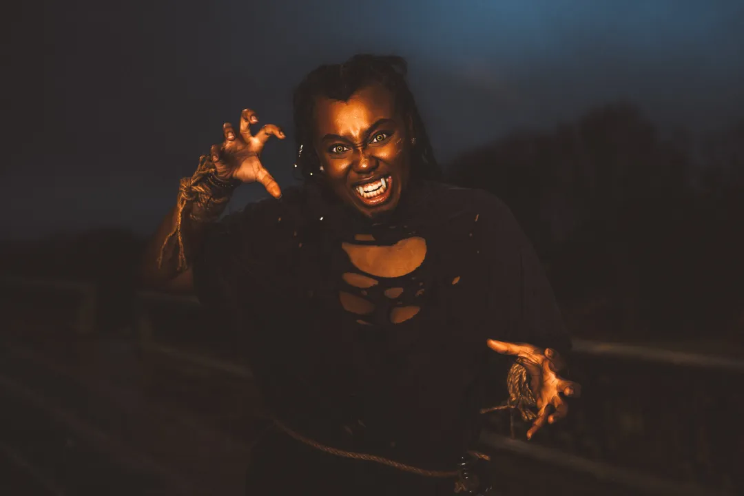 Vampire woman coming in from outside